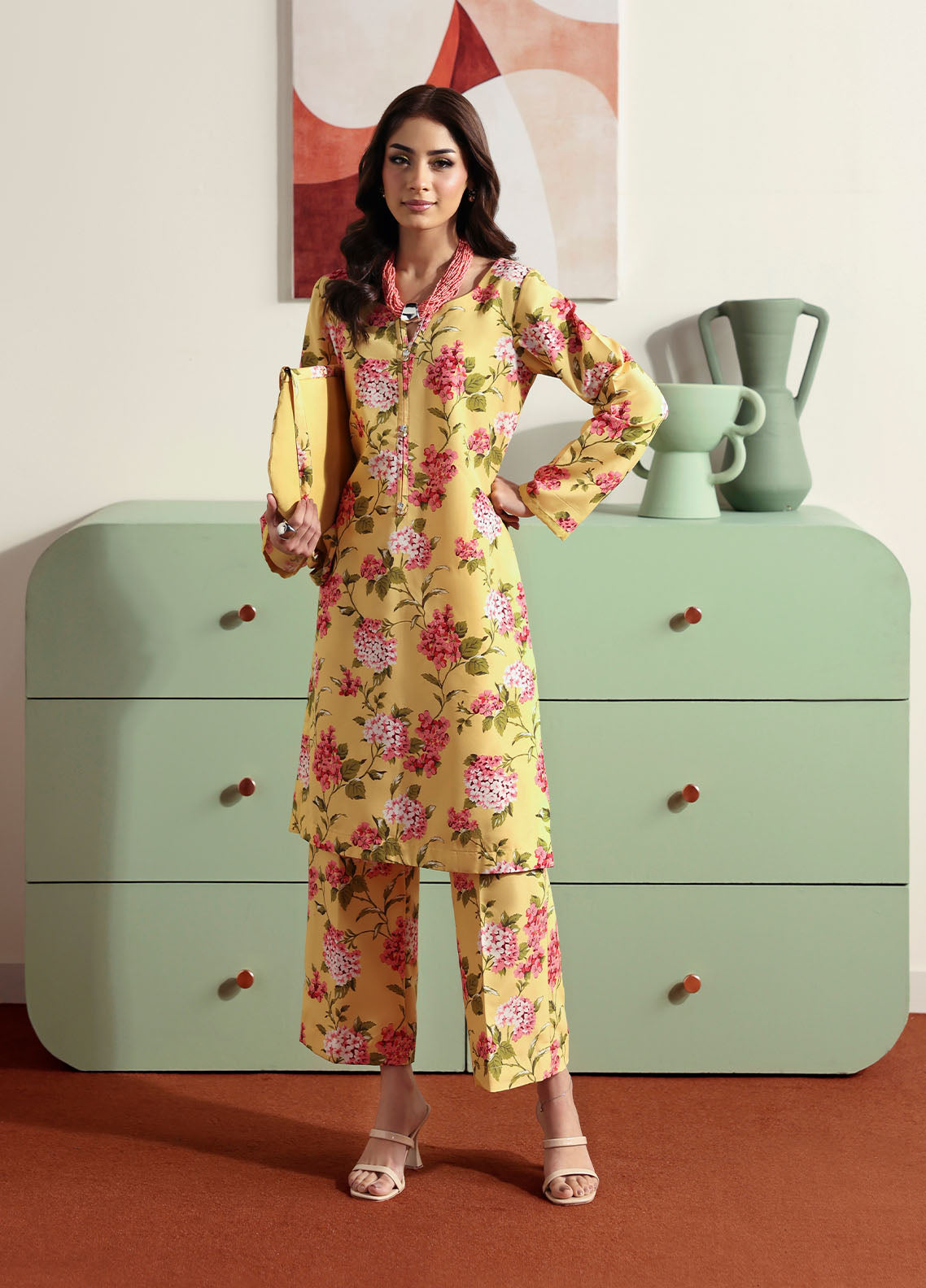 Model wearing yellow floral printed outfit from Gulaal Basics | Honey Dew, Pakistani luxury pret ideal for Pakistani clothes online in UK.