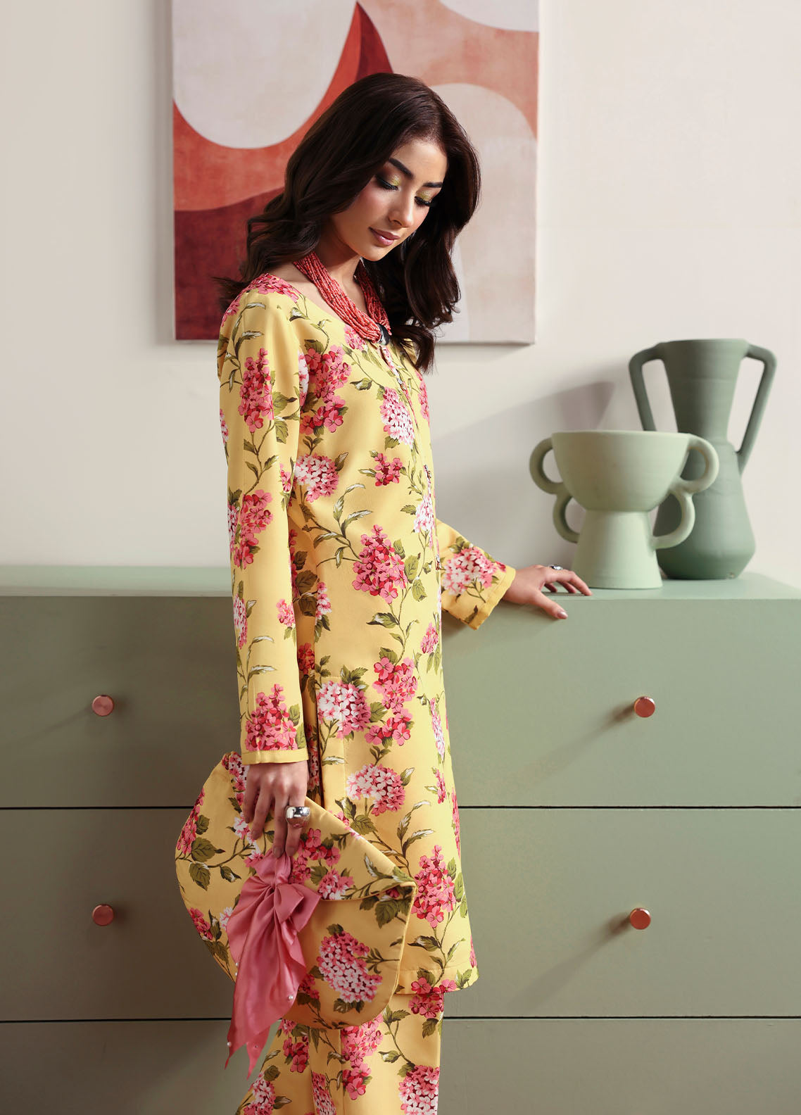 Model wearing yellow floral printed outfit from Gulaal Basics | Honey Dew, Pakistani luxury pret ideal for Pakistani clothes online in UK.