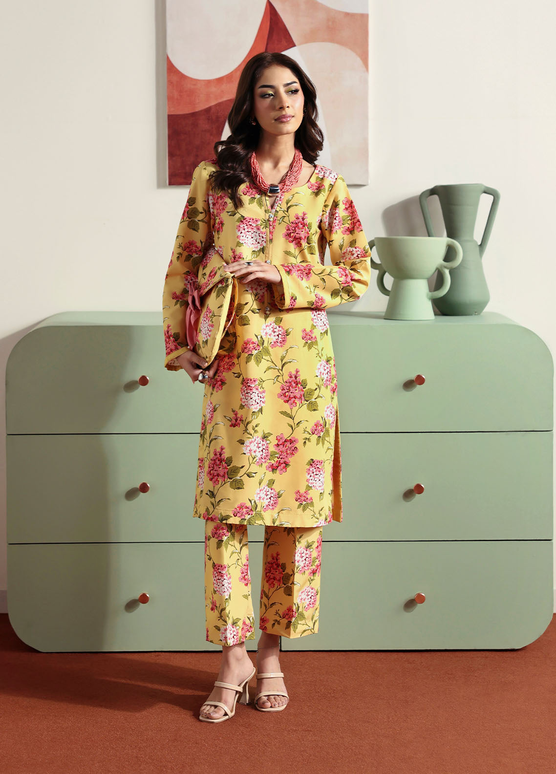 Model wearing yellow floral printed outfit from Gulaal Basics | Honey Dew, Pakistani luxury pret ideal for Pakistani clothes online in UK.