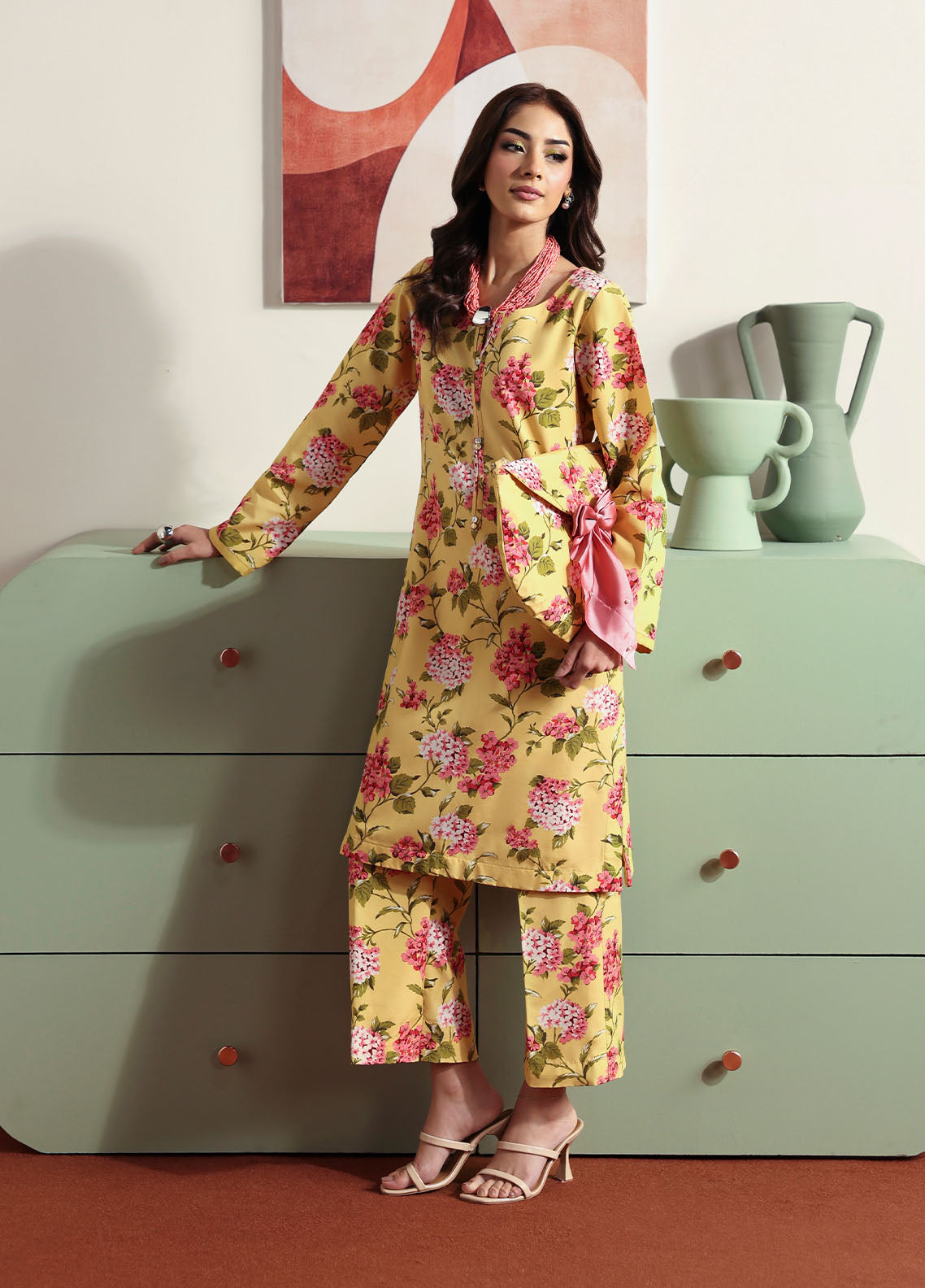 Model wearing yellow floral printed outfit from Gulaal Basics | Honey Dew, Pakistani luxury pret ideal for Pakistani clothes online in UK.