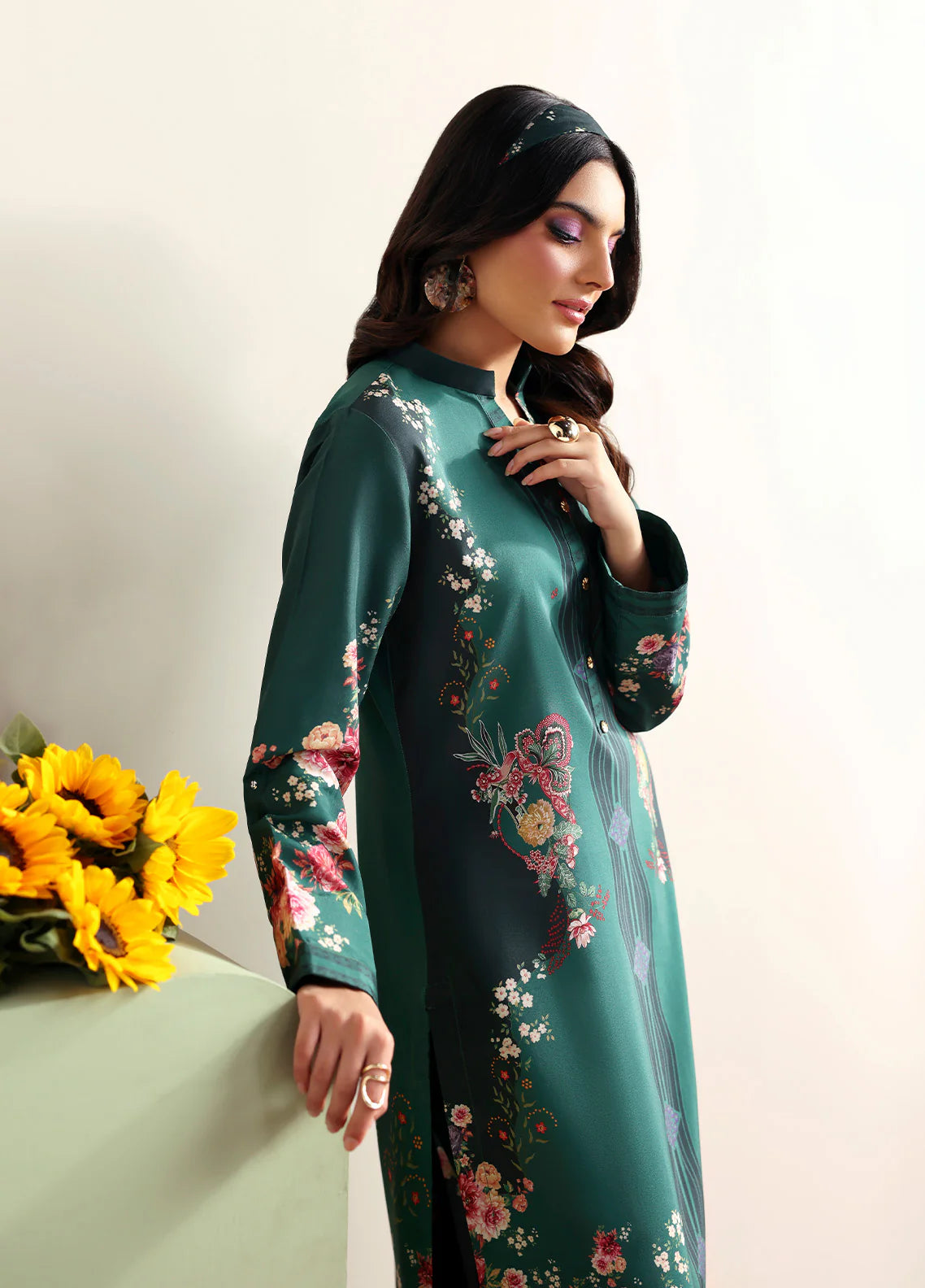 Model wearing Faye by Gulaal in deep green with floral print, a chic Pakistani luxury pret outfit – shop Pakistani clothes online in UK.