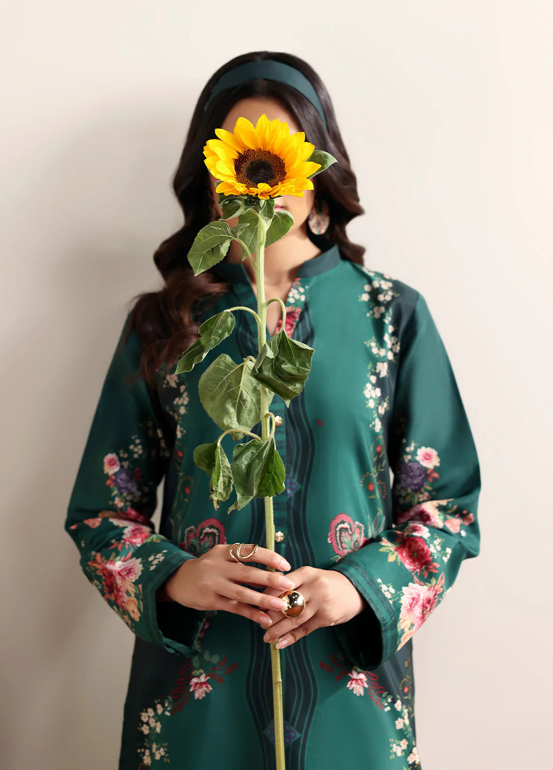 Model wearing Faye by Gulaal in deep green with floral print, a chic Pakistani luxury pret outfit – shop Pakistani clothes online in UK.