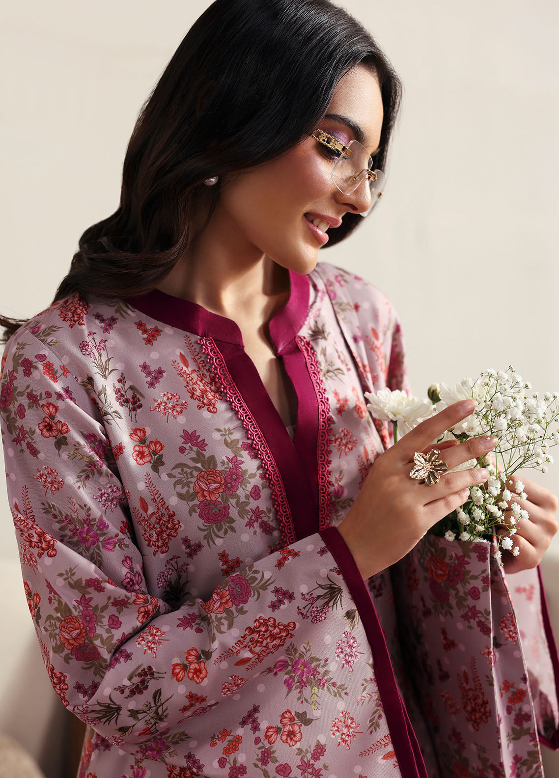 Model wearing pink floral printed outfit from Gulaal Basics | Blossom, Pakistani luxury pret for Pakistani clothes online in UK.