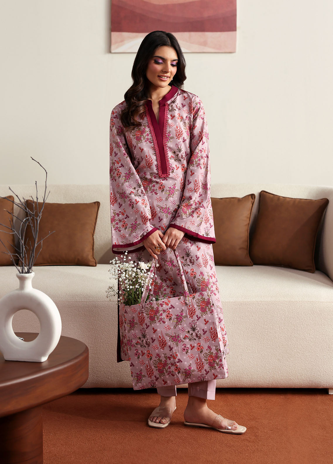 Model wearing pink floral printed outfit from Gulaal Basics | Blossom, Pakistani luxury pret for Pakistani clothes online in UK.