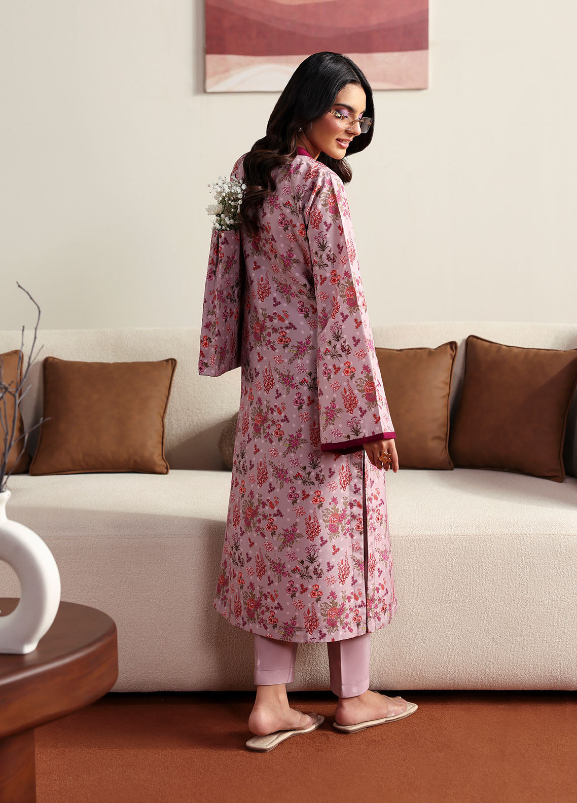 Model wearing pink floral printed outfit from Gulaal Basics | Blossom, Pakistani luxury pret for Pakistani clothes online in UK.