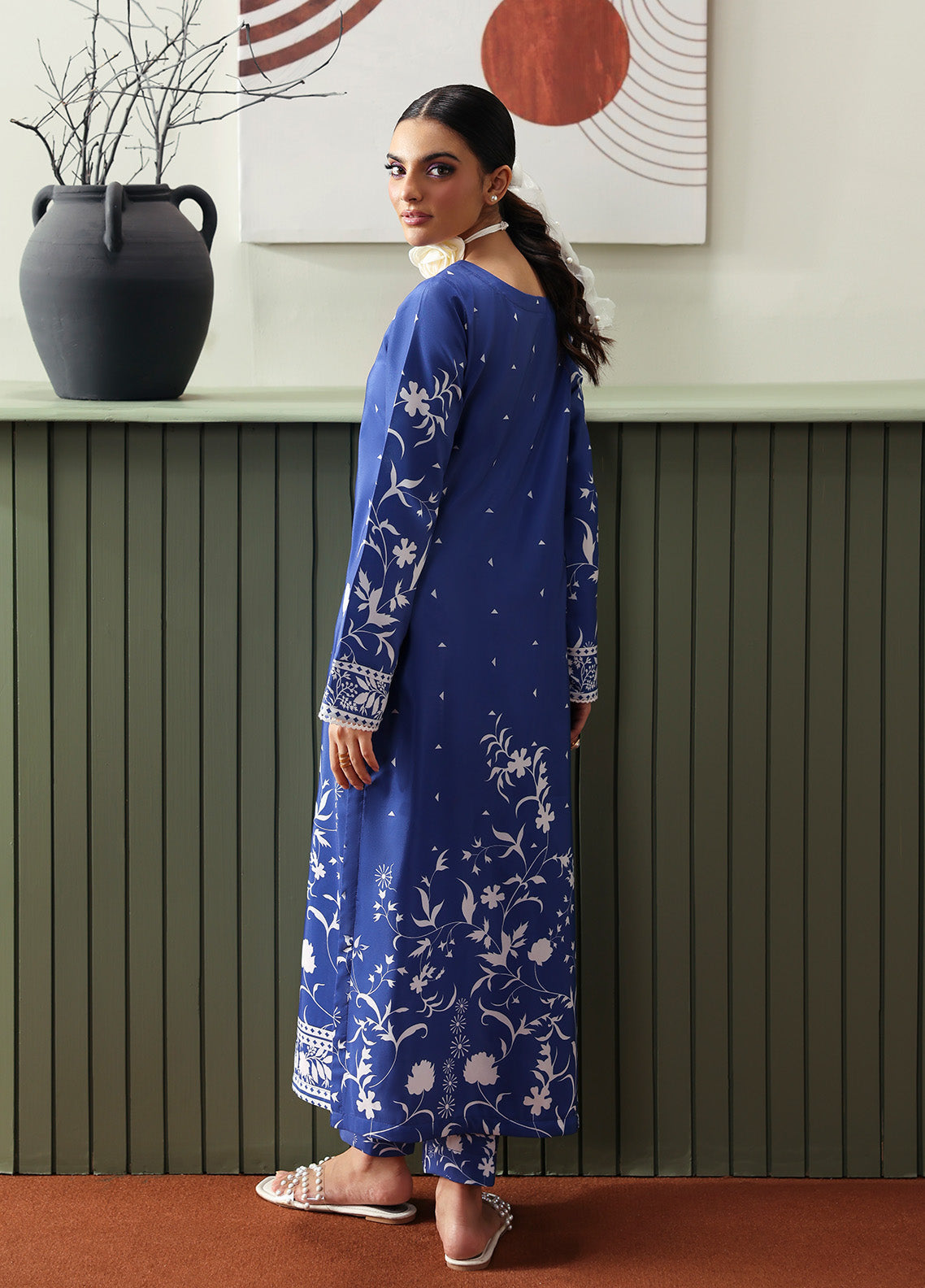 Model wearing Liyanah from Gulaal in a cobalt blue co-ord set with white floral print, perfect for Pakistani luxury pret and casual wear in the UK.