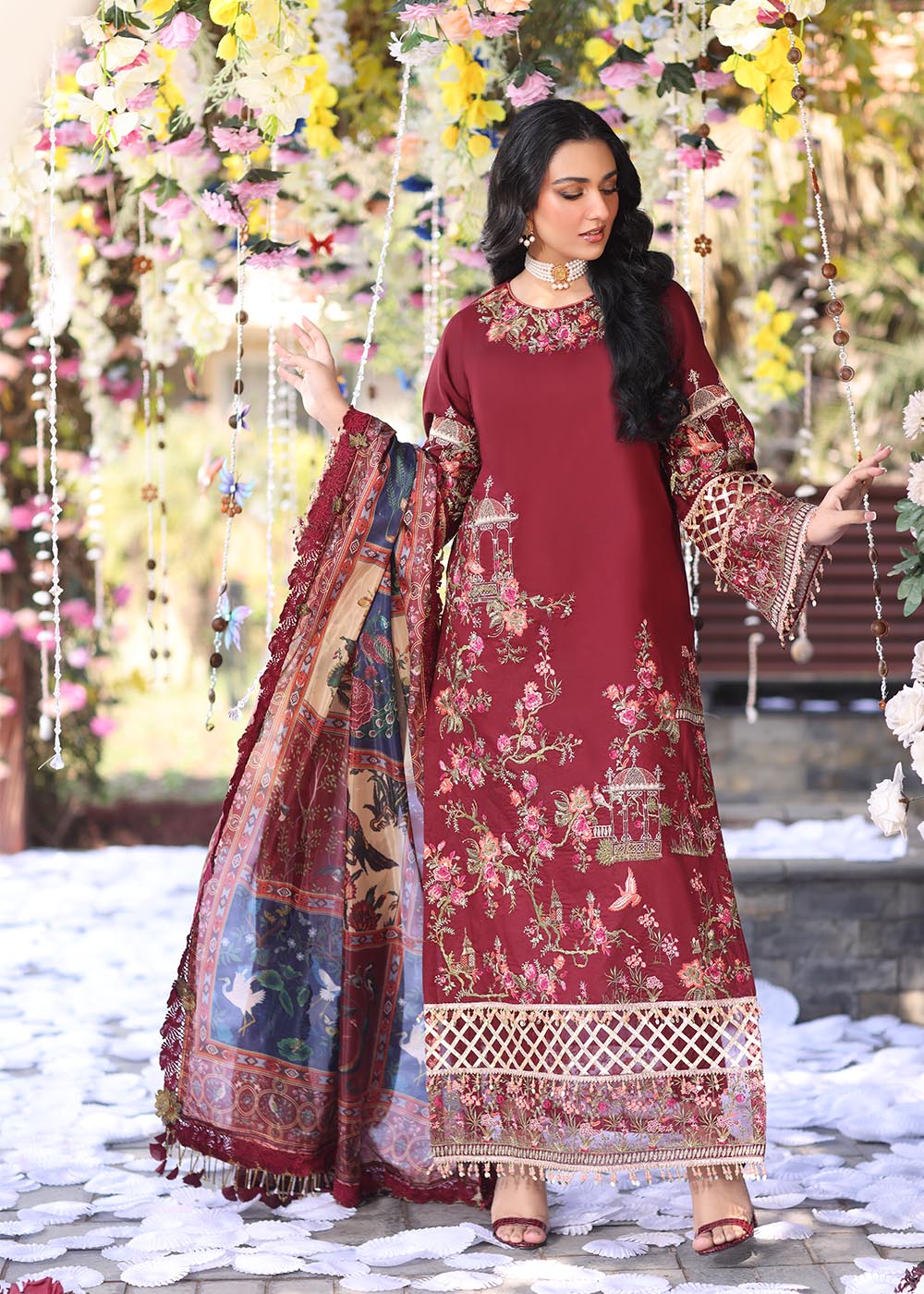Model wearing deep maroon embroidered dress with printed dupatta from Musferah Saad Pretty Girls Luxury Lawn '25 Rosabel, Pakistani clothes online in UK.