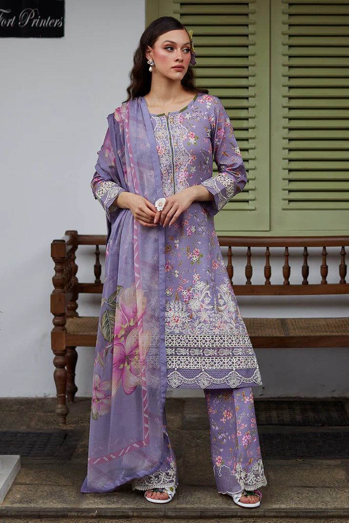 Model wearing Gulaal Saffira Lawn '25 Miaa in lavender with intricate embroidery and floral printed dupatta. Shop Pakistani luxury pret online in the UK.
