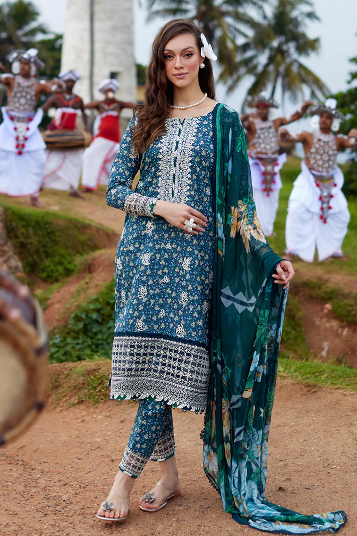 Model wearing Gulaal Saffira Lawn '25 Chloe in deep blue with intricate embroidery and printed dupatta. Shop Pakistani luxury pret online in the UK.