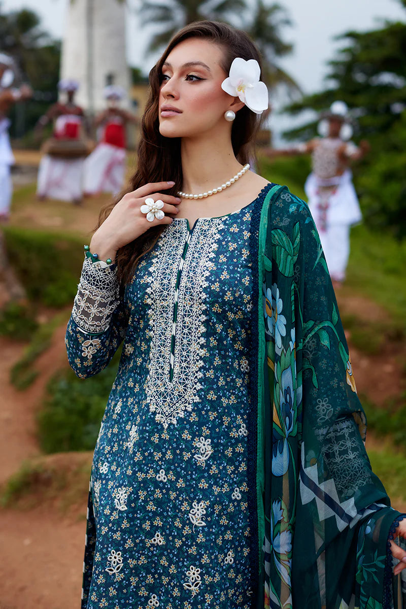 Model wearing Gulaal Saffira Lawn '25 Chloe in deep blue with intricate embroidery and printed dupatta. Shop Pakistani luxury pret online in the UK.