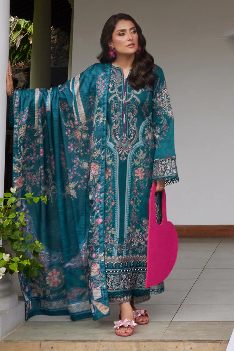 Model wearing Gulaal Saffira Lawn '25 Camila in teal blue with intricate embroidery and digital printed dupatta. Shop Pakistani luxury pret online in the UK.