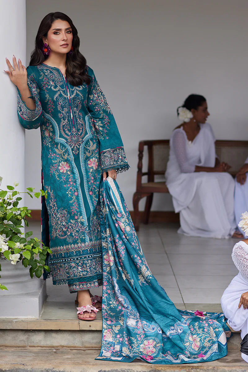 Model wearing Gulaal Saffira Lawn '25 Camila in teal blue with intricate embroidery and digital printed dupatta. Shop Pakistani luxury pret online in the UK.