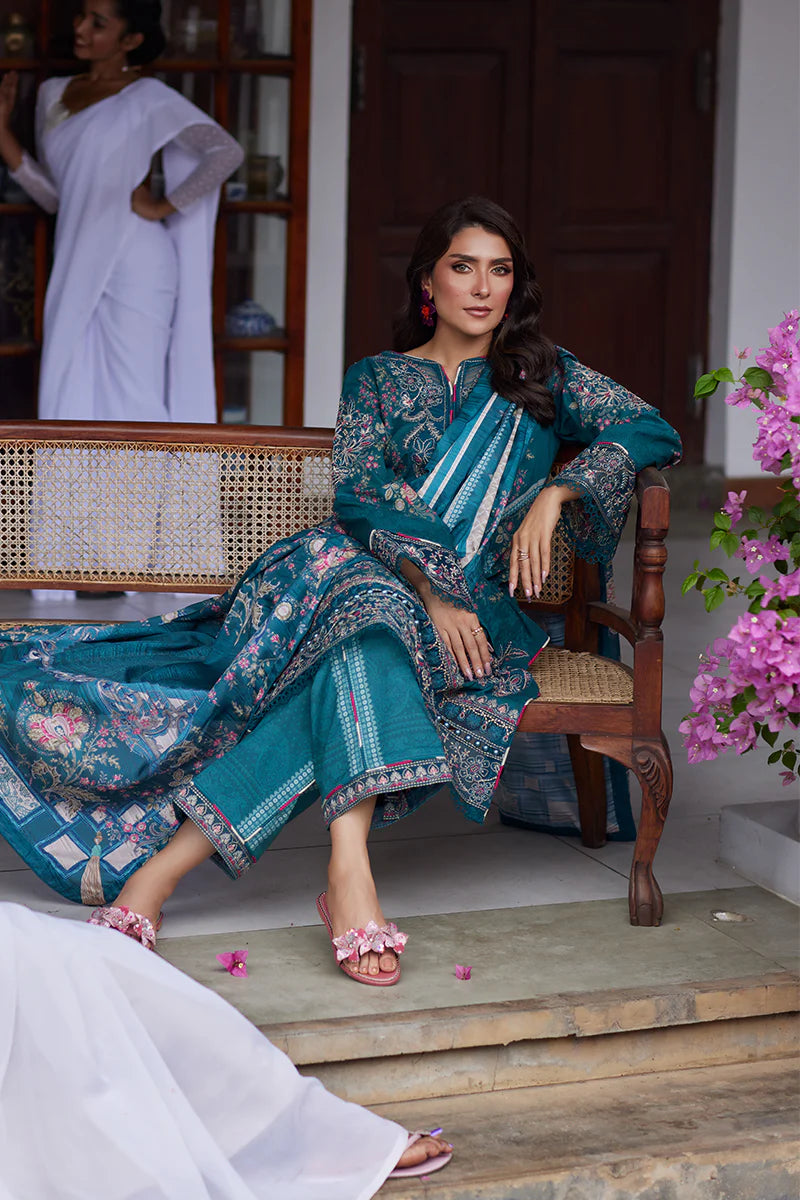Model wearing Gulaal Saffira Lawn '25 Camila in teal blue with intricate embroidery and digital printed dupatta. Shop Pakistani luxury pret online in the UK.