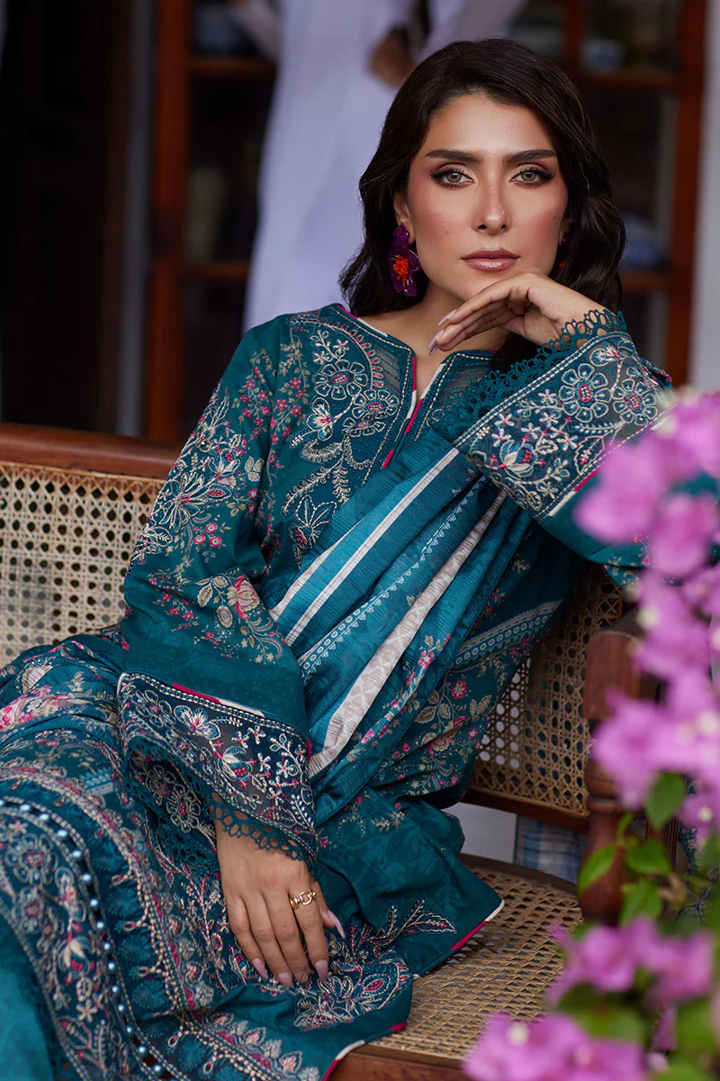 Model wearing Gulaal Saffira Lawn '25 Camila in teal blue with intricate embroidery and digital printed dupatta. Shop Pakistani luxury pret online in the UK.