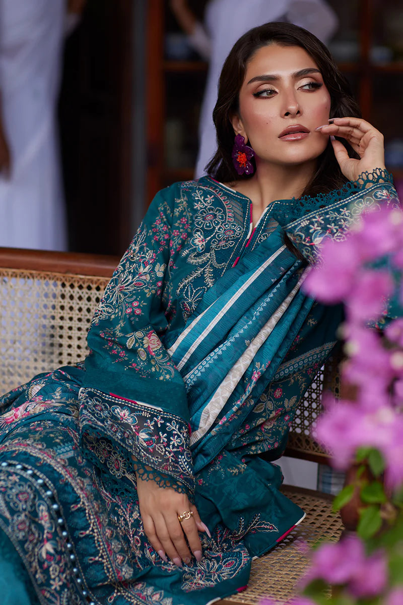 Model wearing Gulaal Saffira Lawn '25 Camila in teal blue with intricate embroidery and digital printed dupatta. Shop Pakistani luxury pret online in the UK.