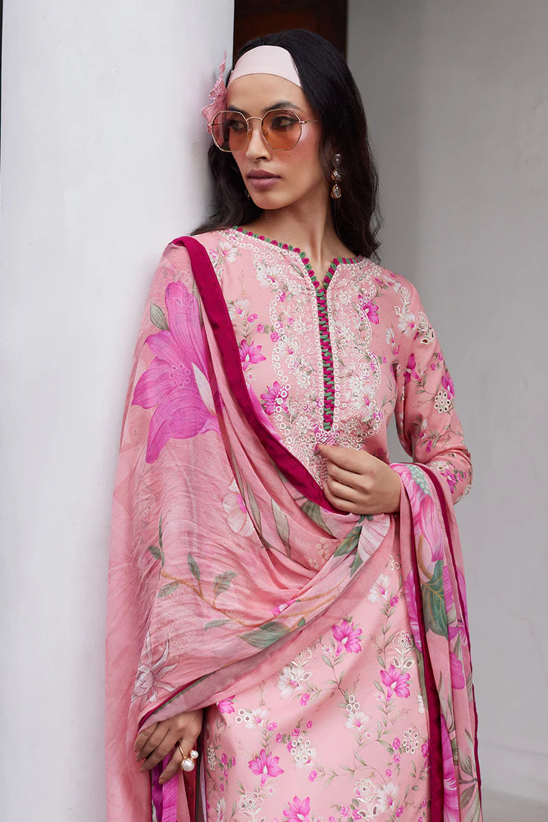 Model wearing Gulaal Saffira Lawn '25 Mila in soft pink with delicate embroidery and floral printed dupatta. Shop Pakistani luxury pret online in the UK.