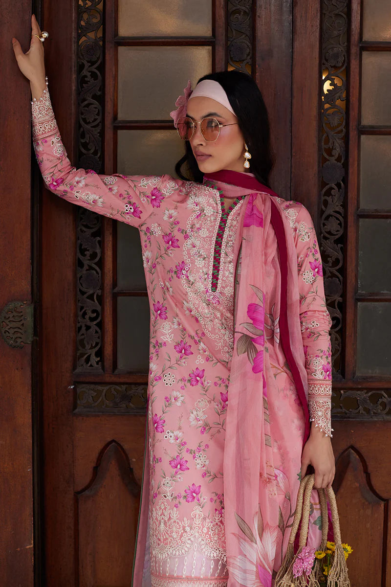Model wearing Gulaal Saffira Lawn '25 Mila in soft pink with delicate embroidery and floral printed dupatta. Shop Pakistani luxury pret online in the UK.