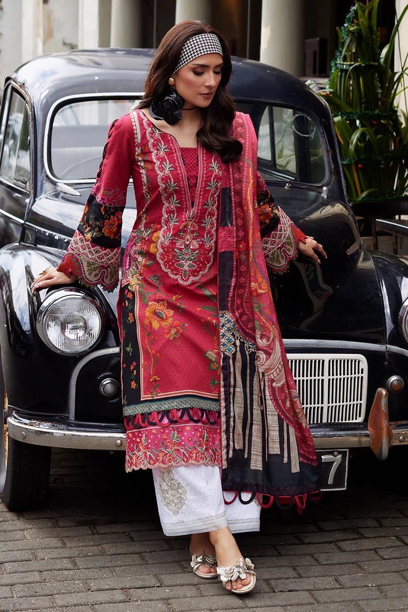 Model wearing Gulaal Saffira Lawn '25 Amelia in deep pink with intricate embroidery and printed dupatta. Shop Pakistani luxury pret online in the UK.