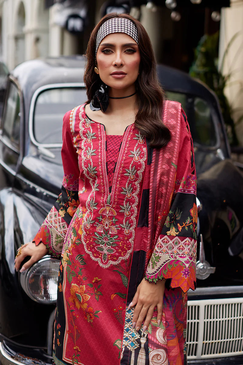 Model wearing Gulaal Saffira Lawn '25 Amelia in deep pink with intricate embroidery and printed dupatta. Shop Pakistani luxury pret online in the UK.