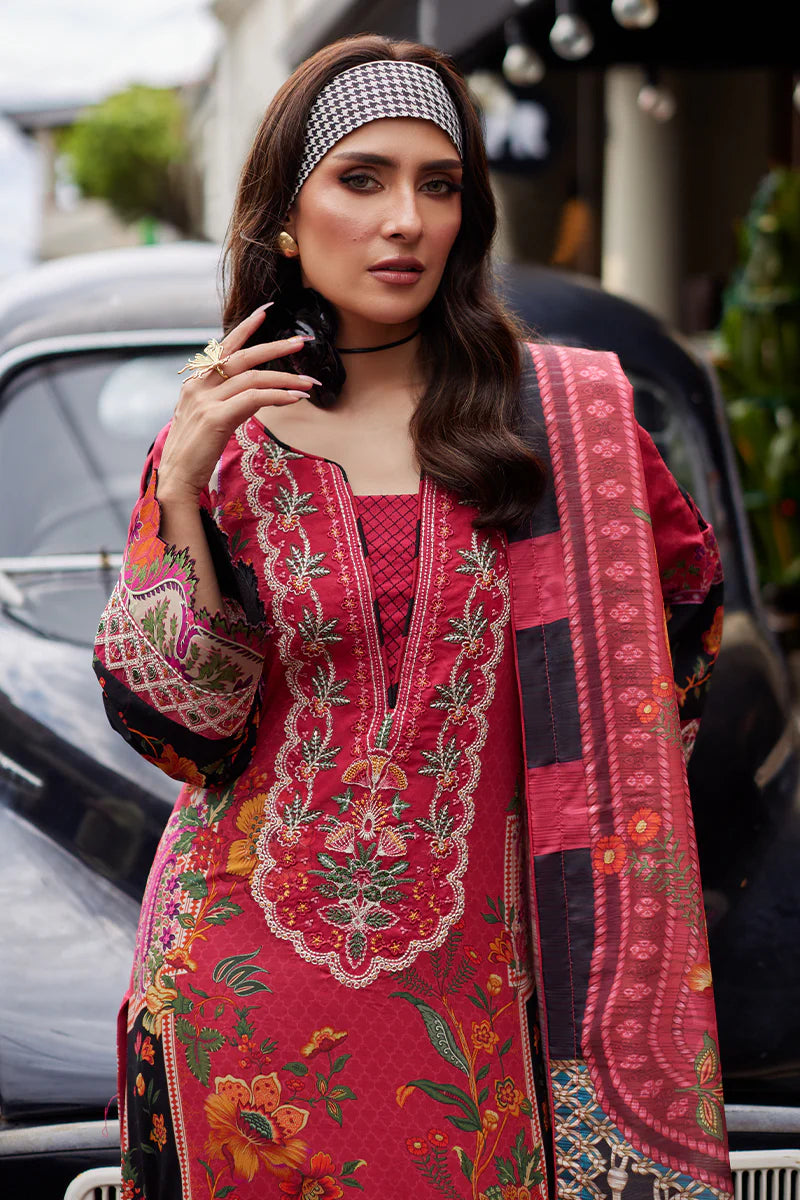Model wearing Gulaal Saffira Lawn '25 Amelia in deep pink with intricate embroidery and printed dupatta. Shop Pakistani luxury pret online in the UK.