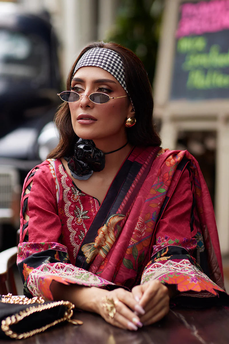 Model wearing Gulaal Saffira Lawn '25 Amelia in deep pink with intricate embroidery and printed dupatta. Shop Pakistani luxury pret online in the UK.