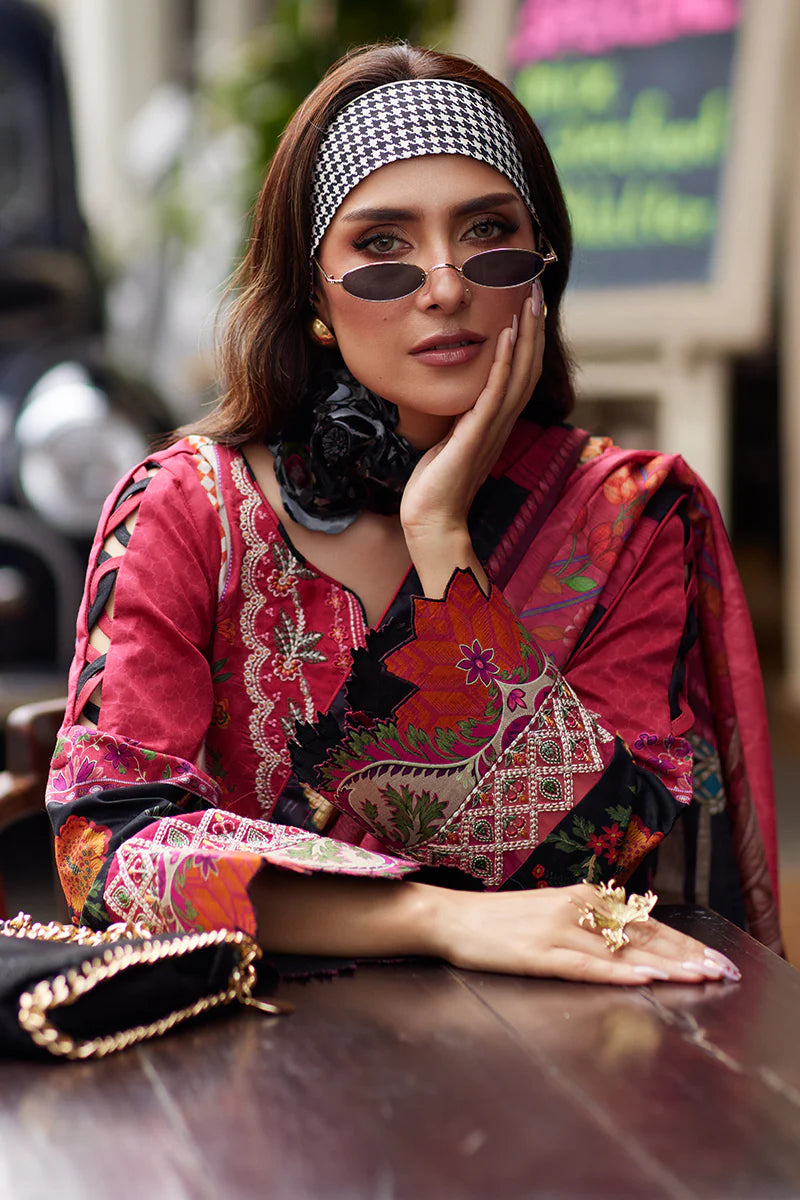 Model wearing Gulaal Saffira Lawn '25 Amelia in deep pink with intricate embroidery and printed dupatta. Shop Pakistani luxury pret online in the UK.