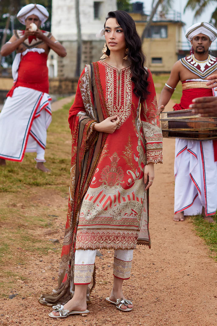 Model wearing Gulaal Saffira Lawn '25 Zhuri in red with intricate gold embroidery and printed dupatta. Shop Pakistani luxury pret online in the UK.