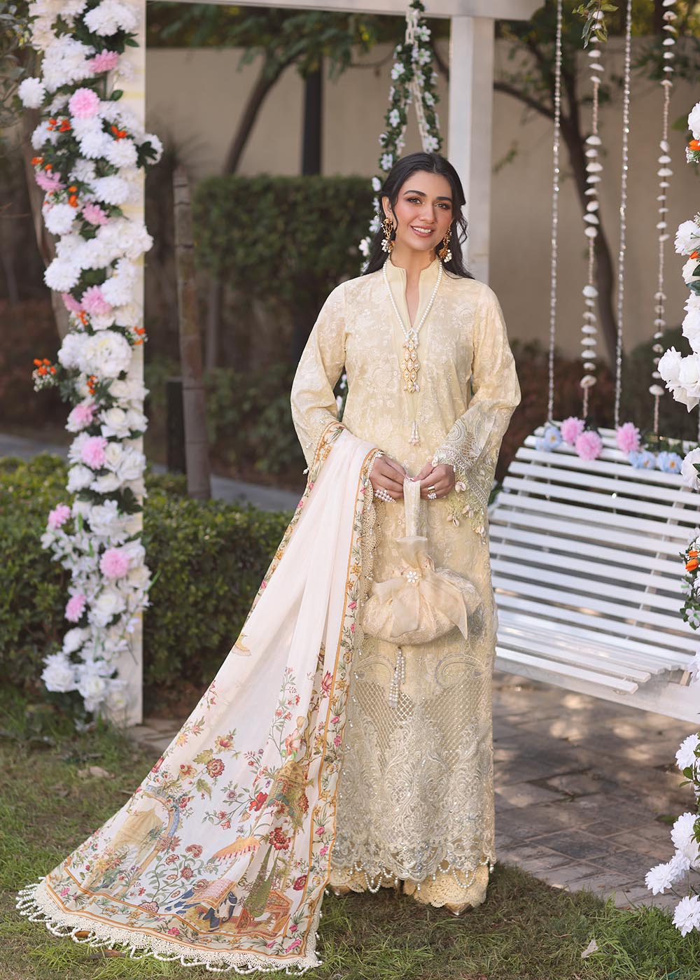 Model wearing beige embroidered dress with printed white dupatta from Musferah Saad Sunshine, Pakistani luxury pret online in UK.