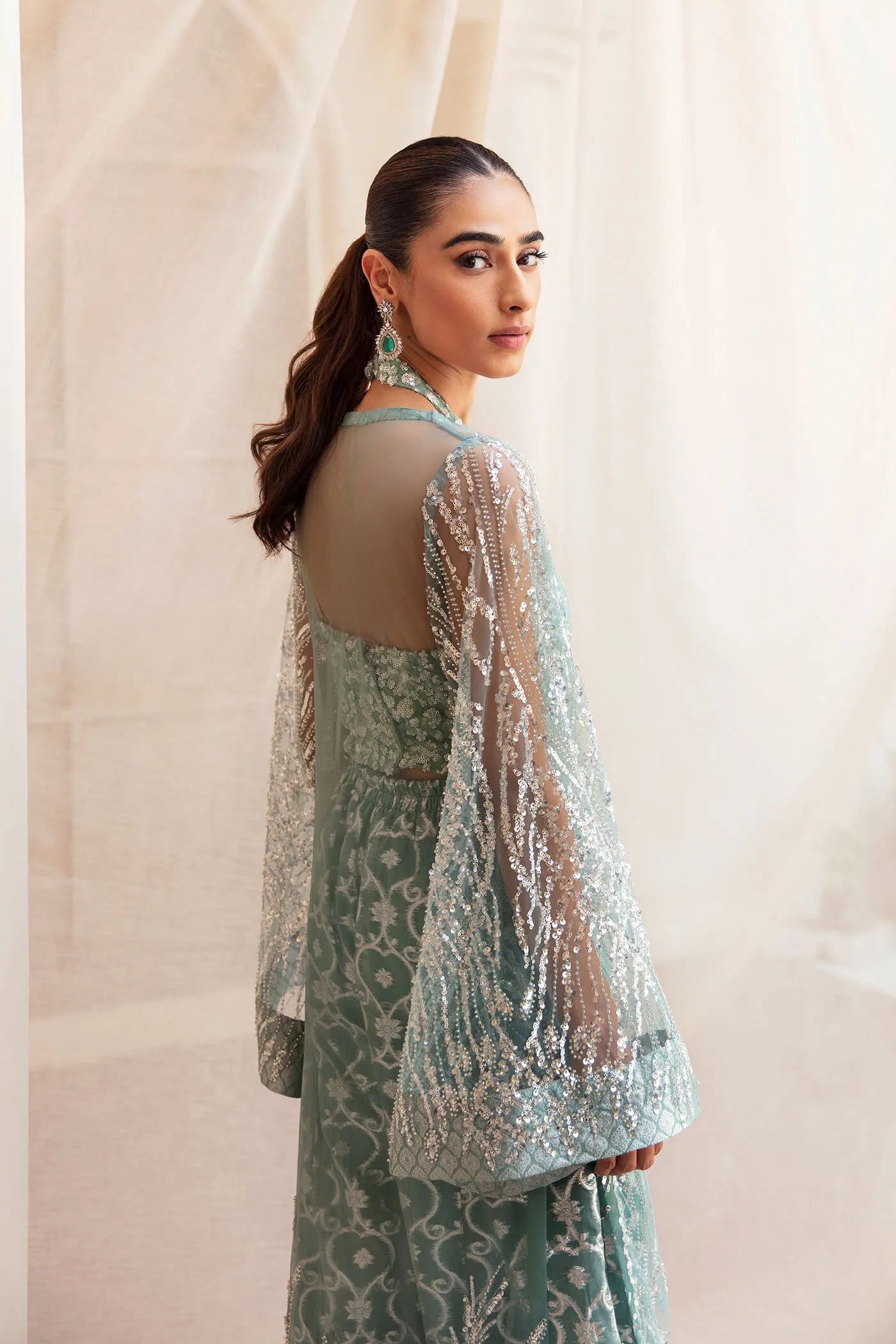 Model wearing Ethereal Embrace Shawl Collection's LUSTROUS LUMIÈRE , an equisite mold by Musferah Saad UK, Pakistani Clothes UK.