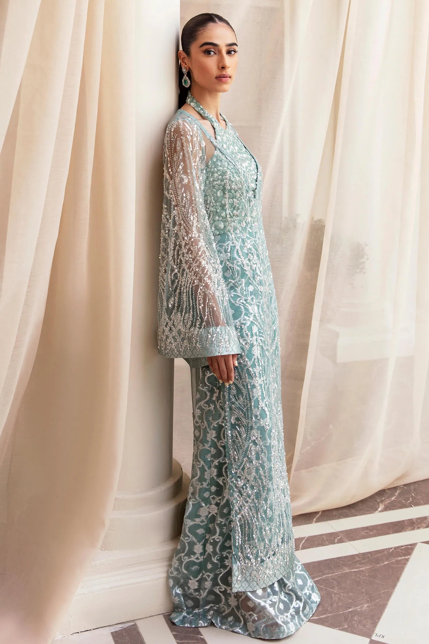 Model wearing Ethereal Embrace Shawl Collection's LUSTROUS LUMIÈRE , an equisite mold by Musferah Saad UK, Pakistani Clothes UK.