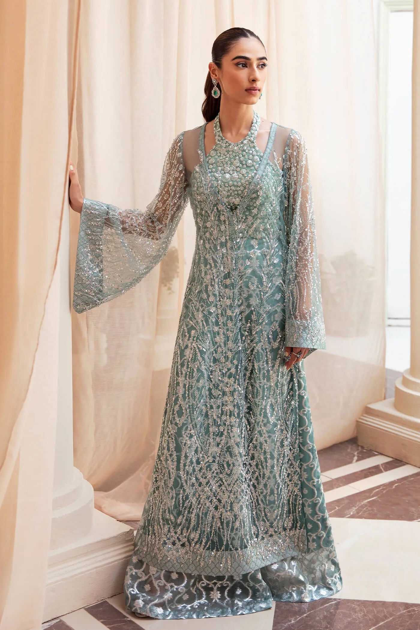 Model wearing Ethereal Embrace Shawl Collection's LUSTROUS LUMIÈRE , an equisite mold by Musferah Saad UK, Pakistani Clothes UK.