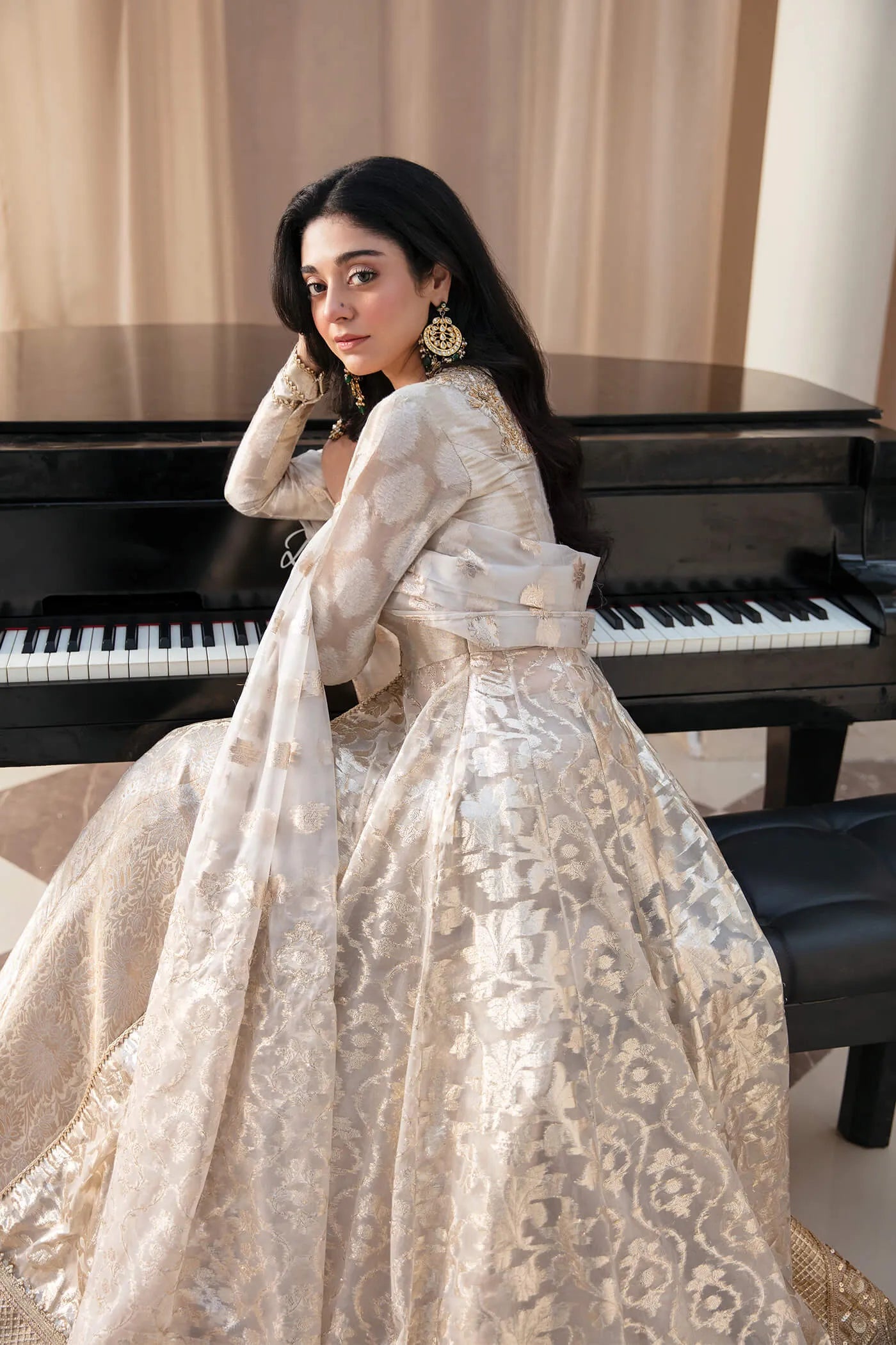 Model wearing Symphony's NOOR’S SYMPHONY, an equisite mold by Musferah Saad UK, Pakistani Clothes UK.