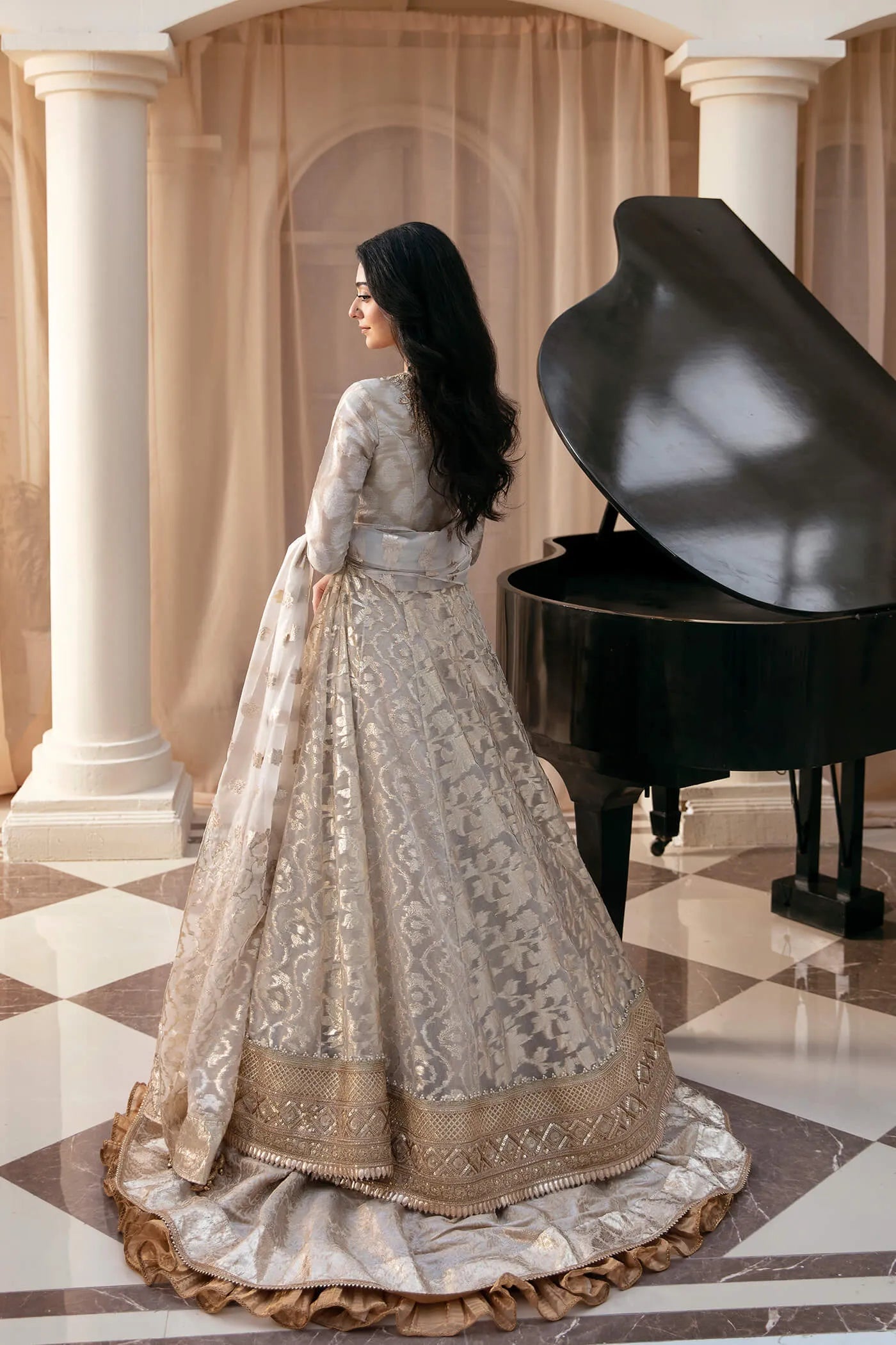 Model wearing Symphony's NOOR’S SYMPHONY, an equisite mold by Musferah Saad UK, Pakistani Clothes UK.