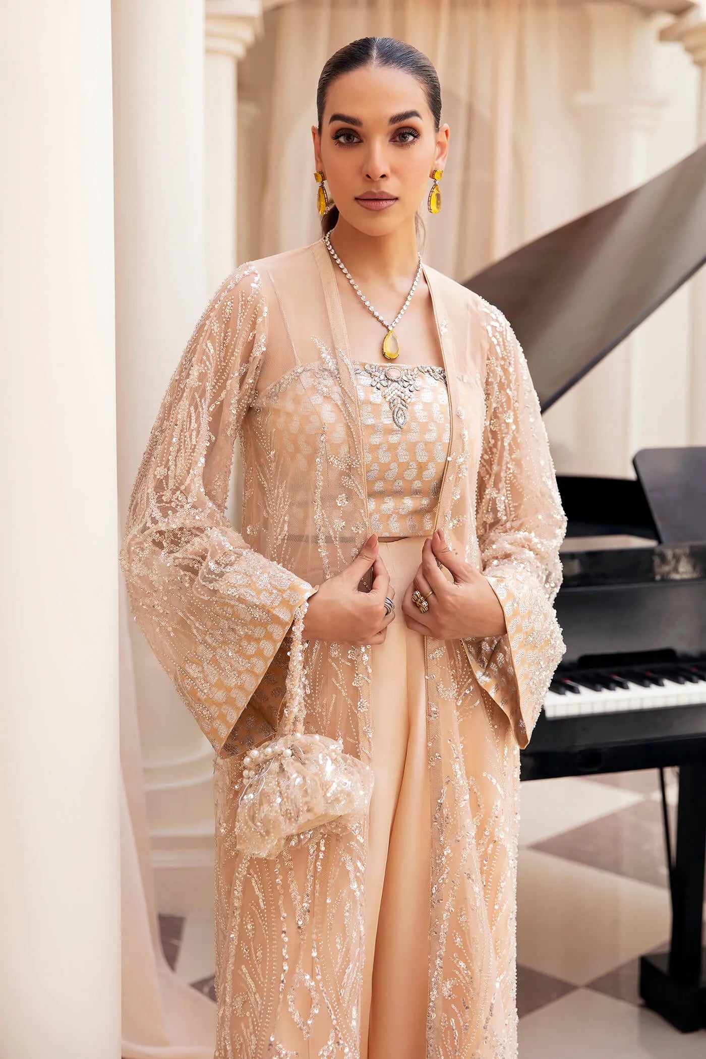 Model wearing Symphony's OPULENT WHISPER, an equisite mold by Musferah Saad UK, Pakistani Clothes UK.