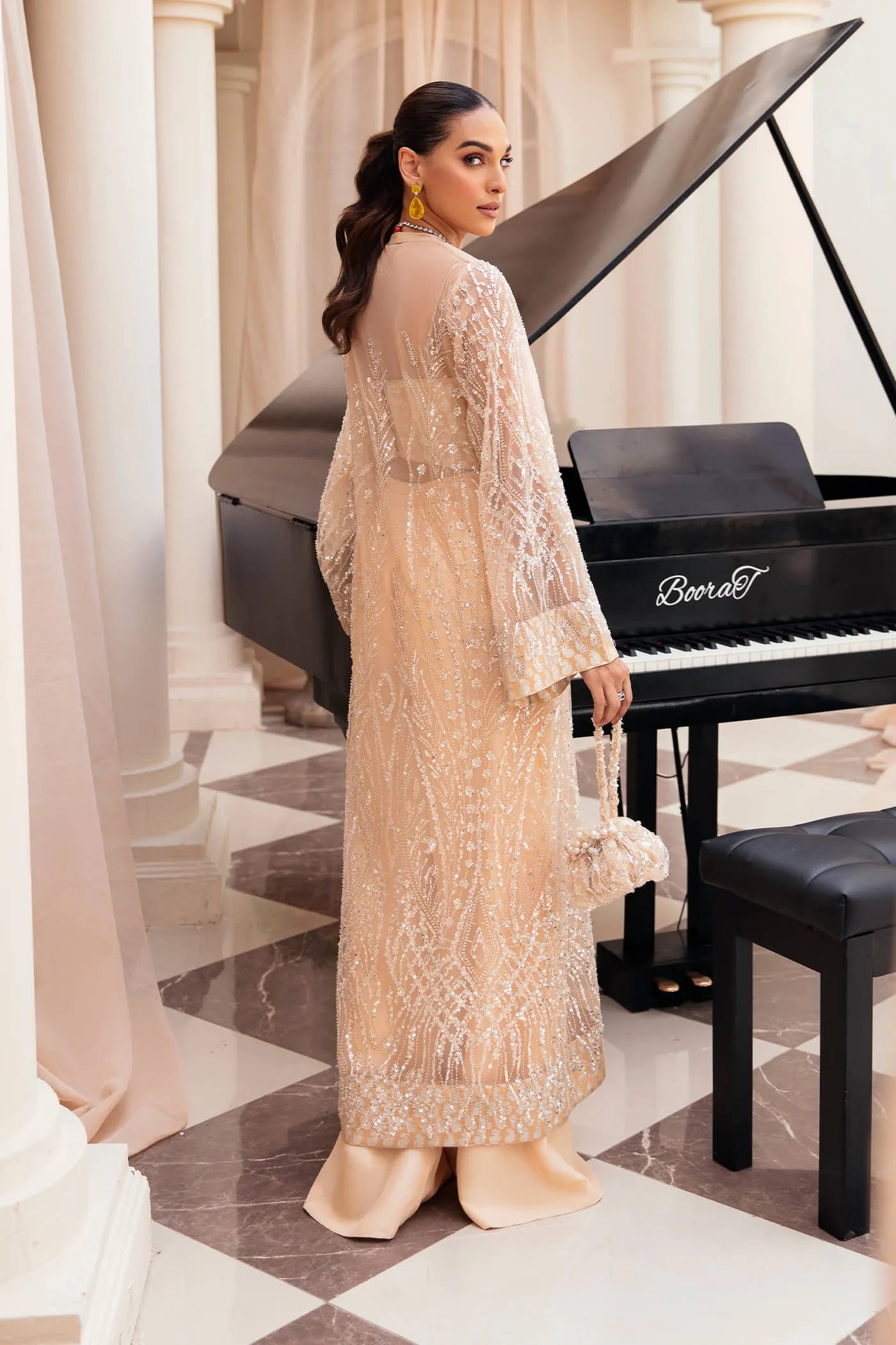 Model wearing Symphony's OPULENT WHISPER, an equisite mold by Musferah Saad UK, Pakistani Clothes UK.
