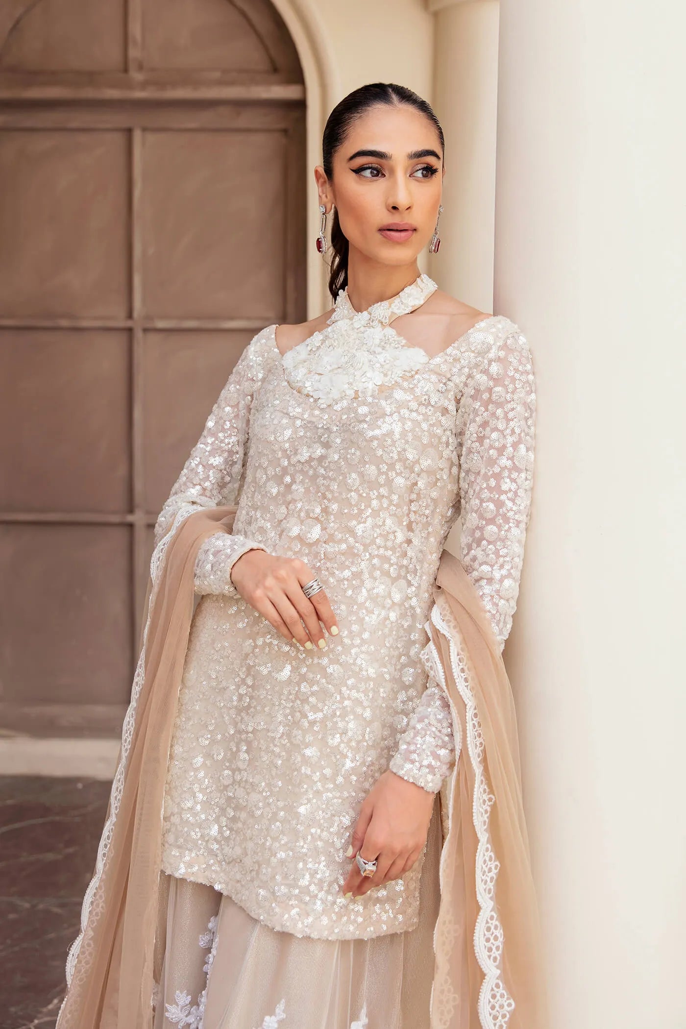 Model wearing Symphony's RADIANT PEARL, an equisite mold by Musferah Saad UK, Pakistani Clothes UK.