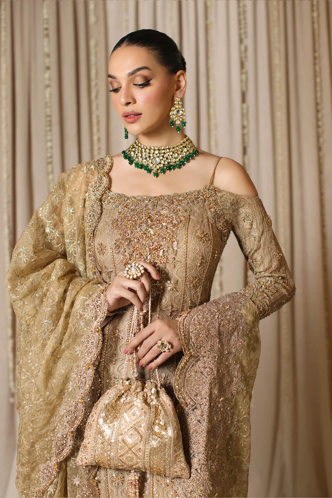 Model wearing Musferah Saad Celestial Crown, a luxurious Pakistani bridal dress in UK.