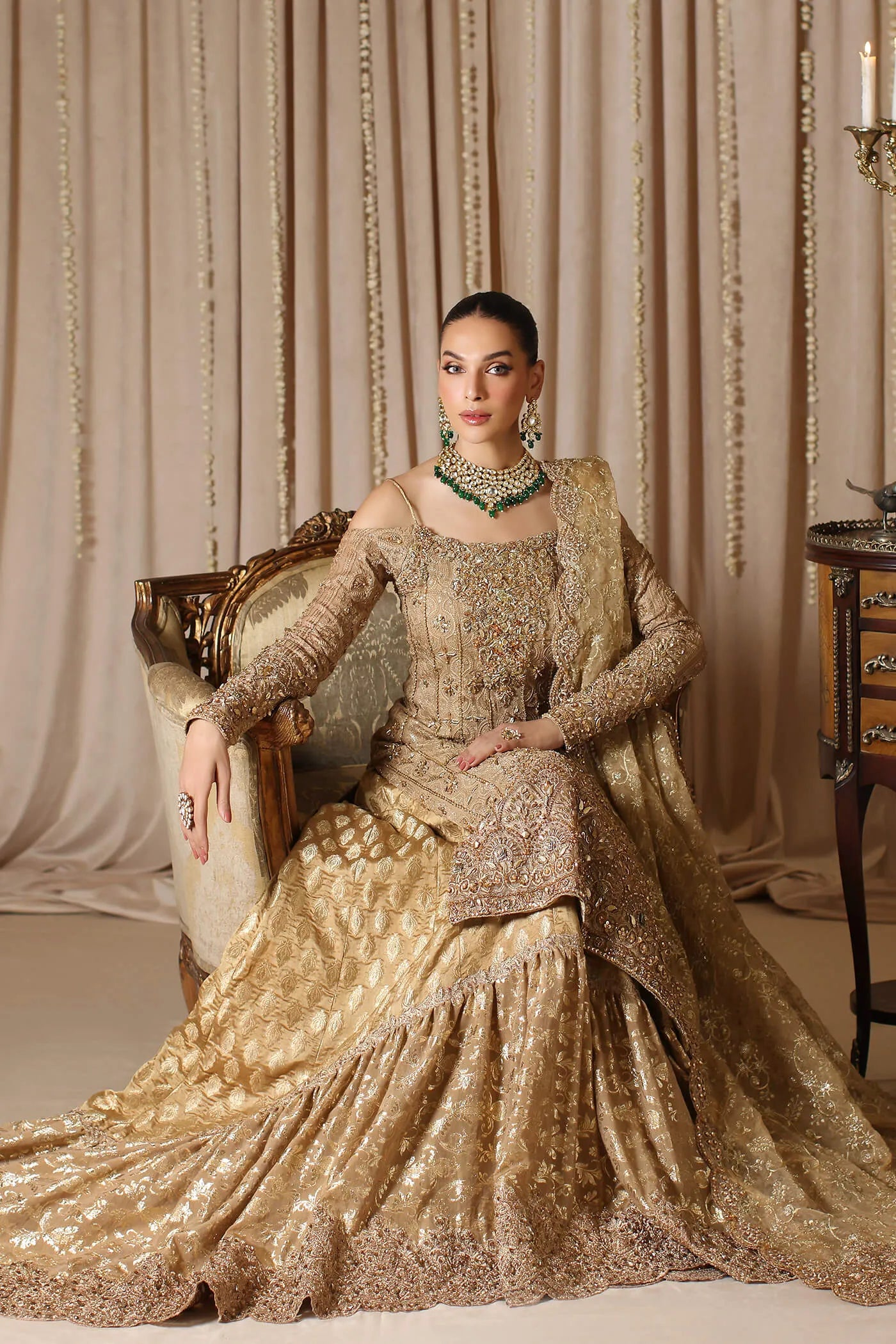 Model wearing Musferah Saad Celestial Crown, a luxurious Pakistani bridal dress in UK.