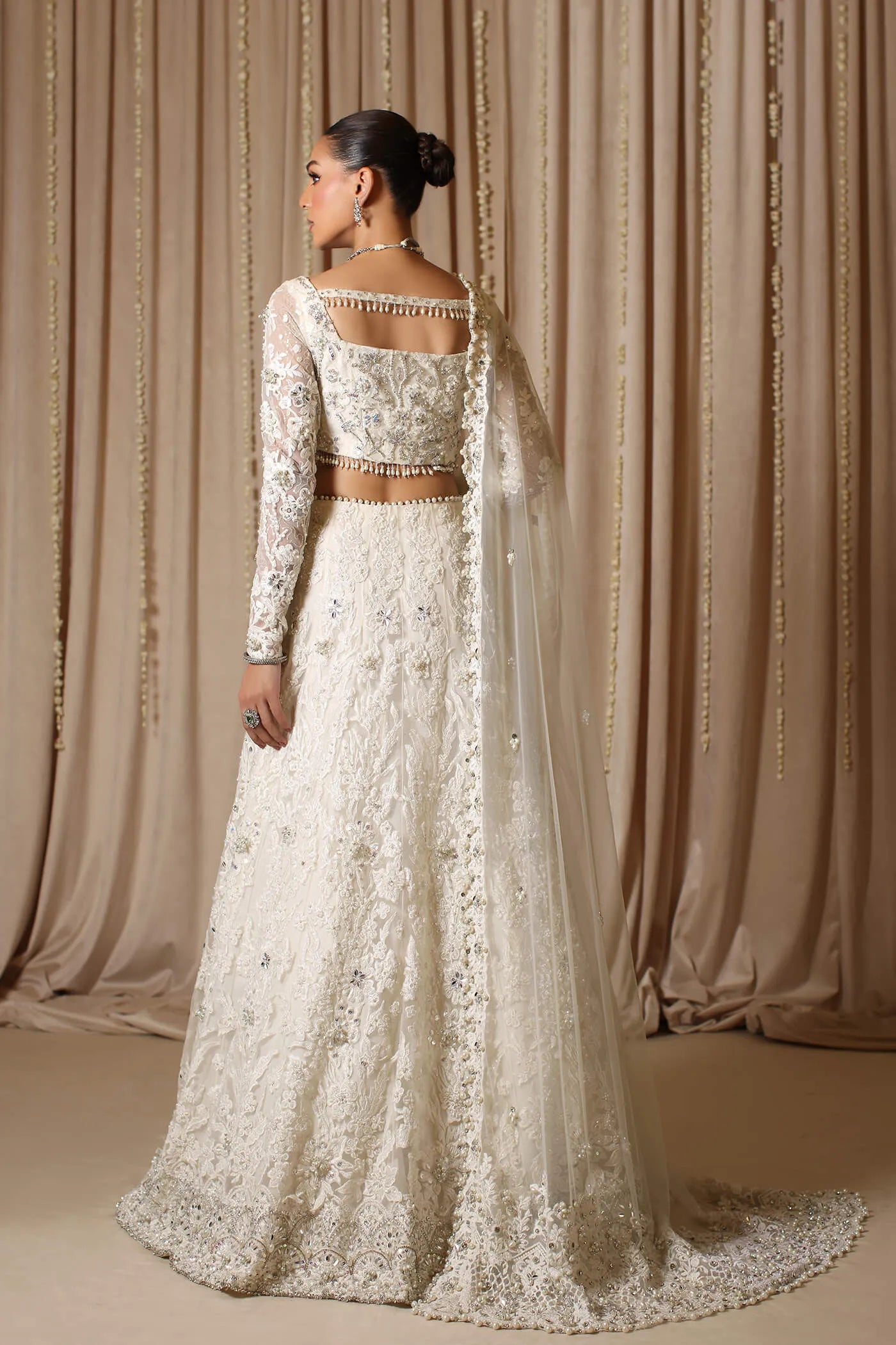Model wearing The Modern Maharani's DIVINE SWAN, an equisite mold by Musferah Saad UK, Pakistani Clothes UK.