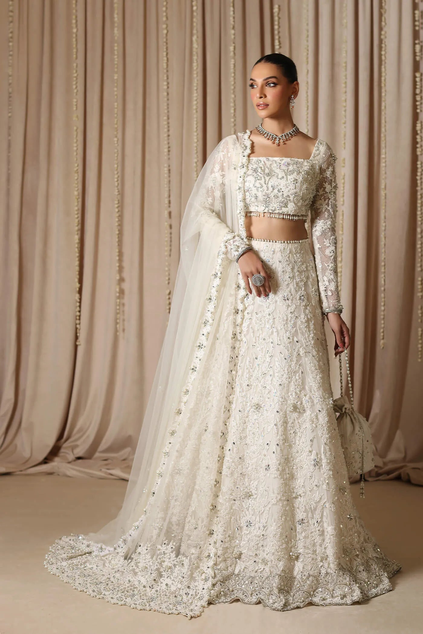 Model wearing The Modern Maharani's DIVINE SWAN, an equisite mold by Musferah Saad UK, Pakistani Clothes UK.