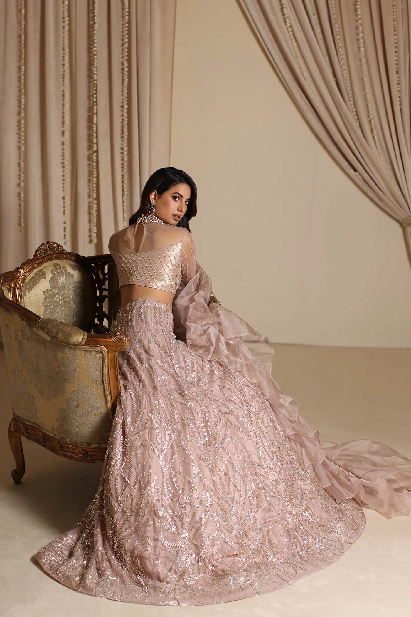 Model wearing The Modern Maharani's PRINCESS ROSETTE, an equisite mold by Musferah Saad UK, Pakistani Clothes UK.