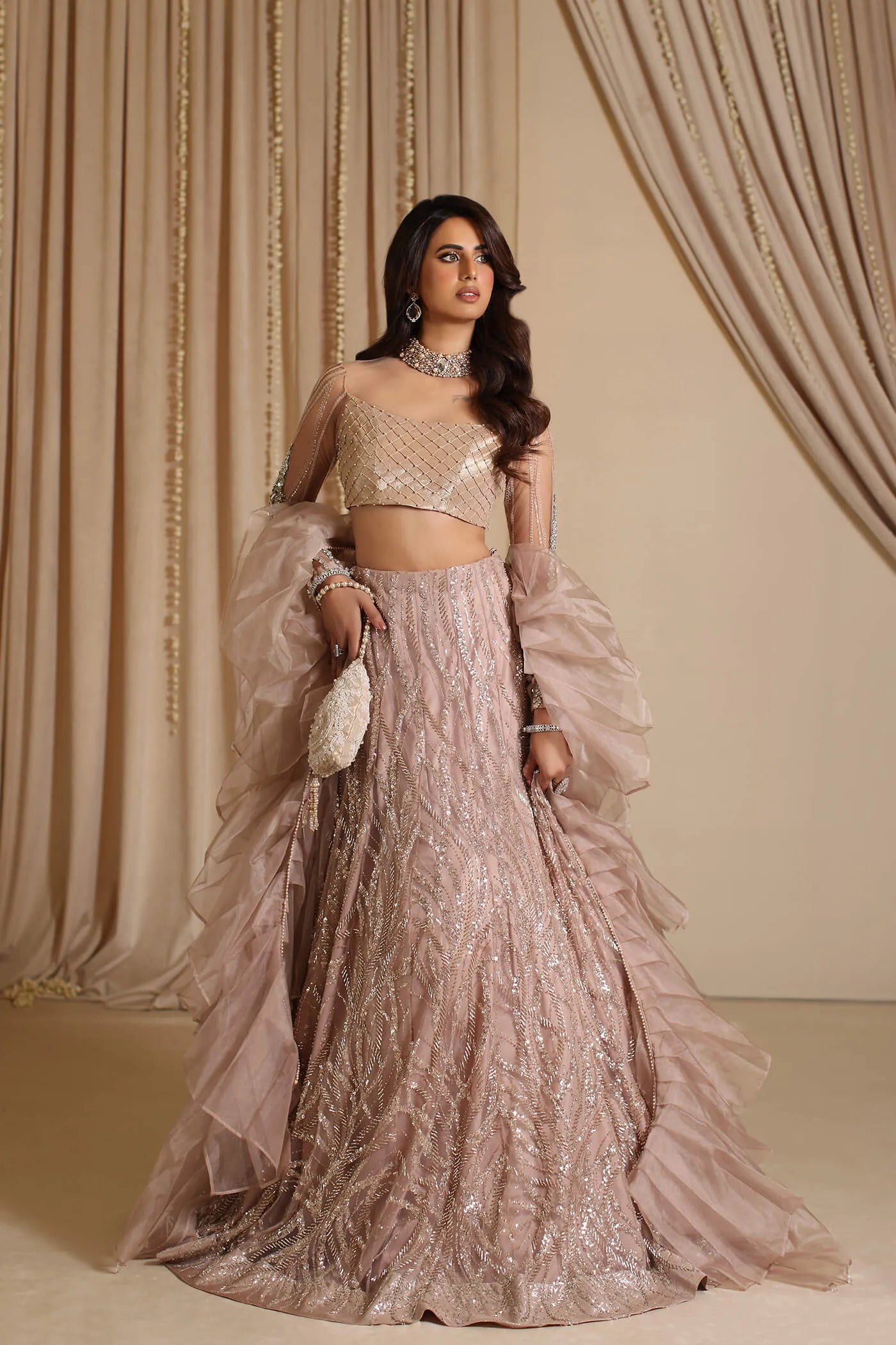 Model wearing The Modern Maharani's PRINCESS ROSETTE, an equisite mold by Musferah Saad UK, Pakistani Clothes UK.
