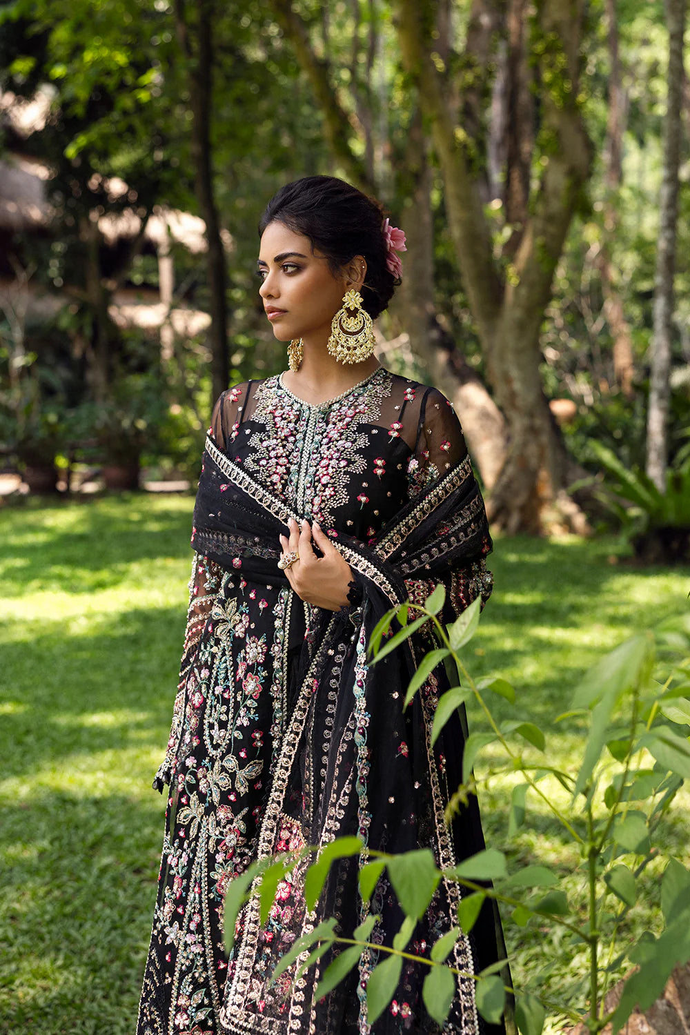 Model wearing Saira Rizwan AVINA-SRF25-02 in black with pastel floral embroidery – Pakistani luxury pret, shop online in UK.