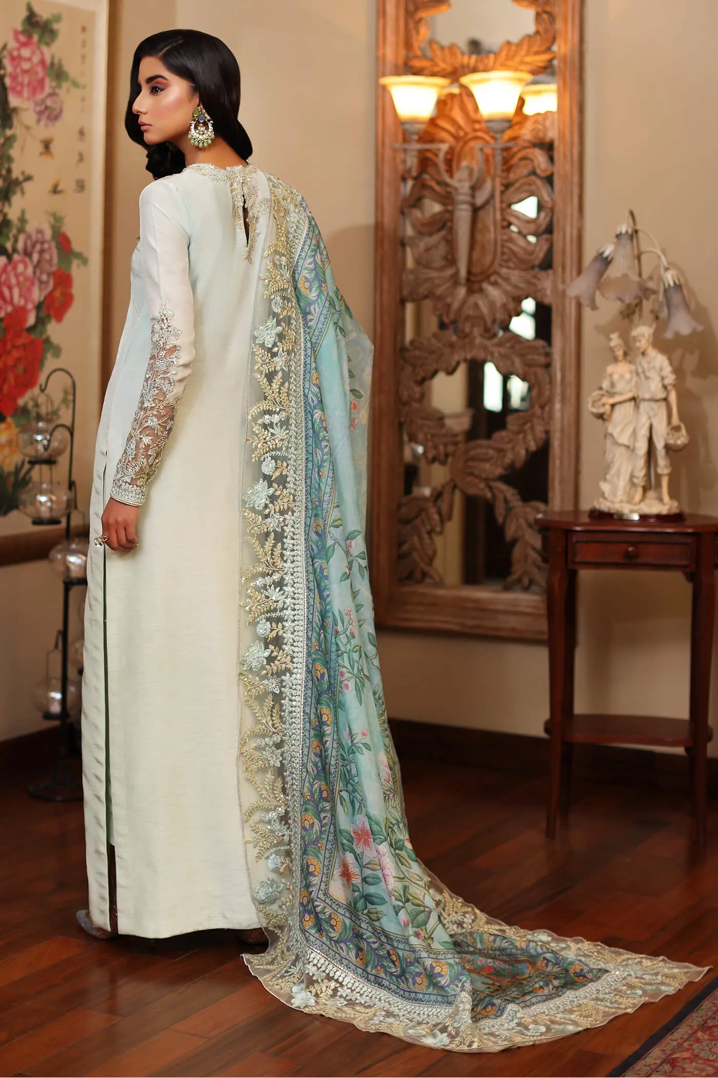 Elegant model in Musferah Saad's AZURE dress from the Eid '24 collection, classic Pakistani fashion UK.