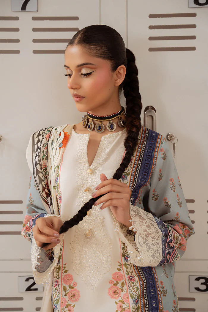 Model wearing cream and pastel multicolour ZUMRA-B-SRL25-07 from Saira Rizwan Laneem SS/25, perfect for Pakistani luxury pret in the UK.