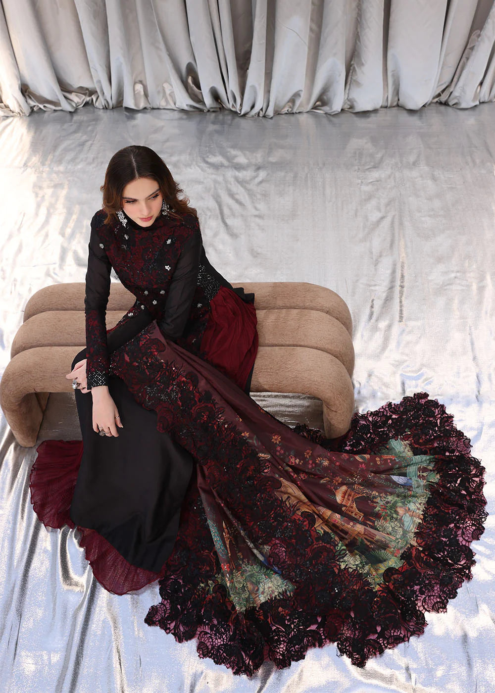 Model wearing black and deep red embroidered long dress with printed maroon dupatta from Musferah Saad Moonlit Glam, Pakistani Luxury pret in UK.