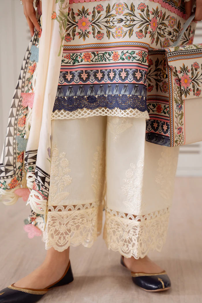 Model wearing cream and pastel multicolour ZUMRA-B-SRL25-07 from Saira Rizwan Laneem SS/25, perfect for Pakistani luxury pret in the UK.