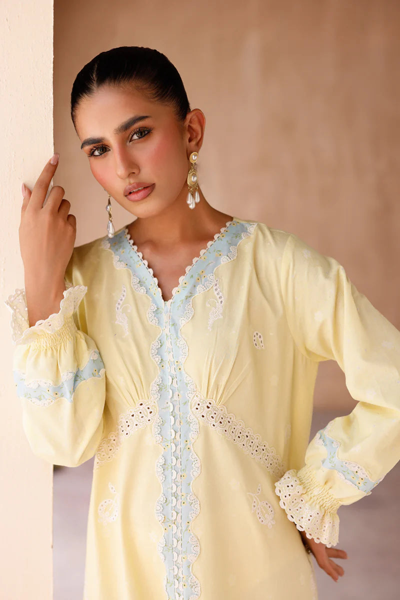 Model wearing yellow embroidered coords EP-10 Elin from Qalamkar, Pakistani luxury pret available online in UK.