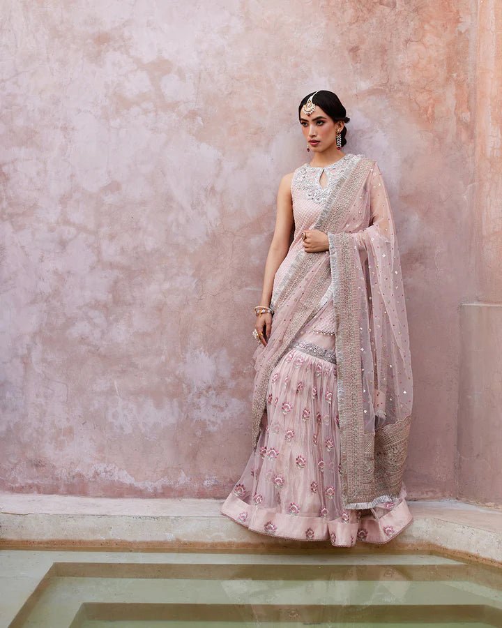 Model wearing a pink Eilees dress from Faiza Saqlain's Lenora Luxury Pret '24 collection. Pakistani clothes online in UK.