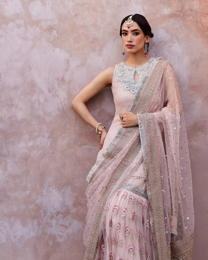 Model wearing a pink Eilees dress from Faiza Saqlain's Lenora Luxury Pret '24 collection. Pakistani clothes online in UK.